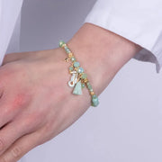 Bracciale in Metallo con sfere verdi e ciondolo cavalluccio marino