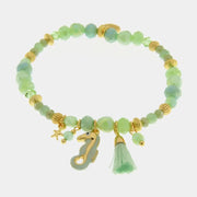 Bracciale in Metallo con sfere verdi e ciondolo cavalluccio marino