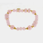 Bracciale in Metallo con sfere rosa e dettagli dorati
