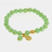 Bracciale in Metallo con sfere verdi e ciondolo conchiglia