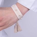 Bracciale in Metallo  in tessuto colore panna con fiorellini