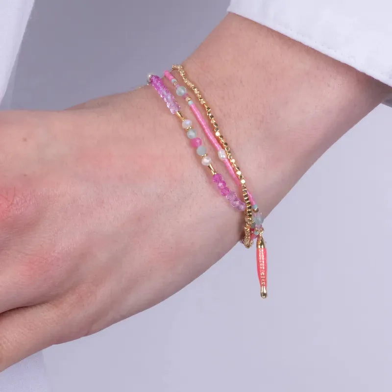 Bracciale in Metallo con perline rosse e ciondolo pesciolino