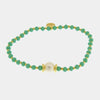 Bracciale in Metallo perla sintetica centrale e cristalli verde