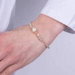 Bracciale in Metallo perla sintetica centrale e cristalli in colore pastello