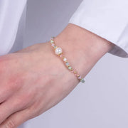 Bracciale in Metallo perla sintetica centrale e cristalli in colore pastello