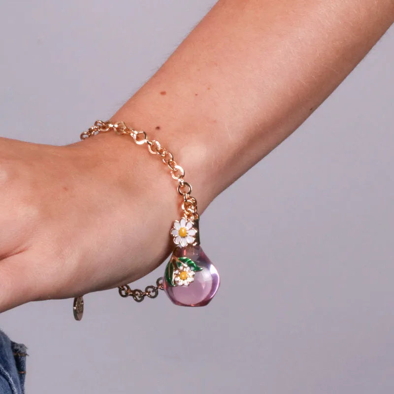 Bracciale in Metallo con bottiglina e fiori bianchi