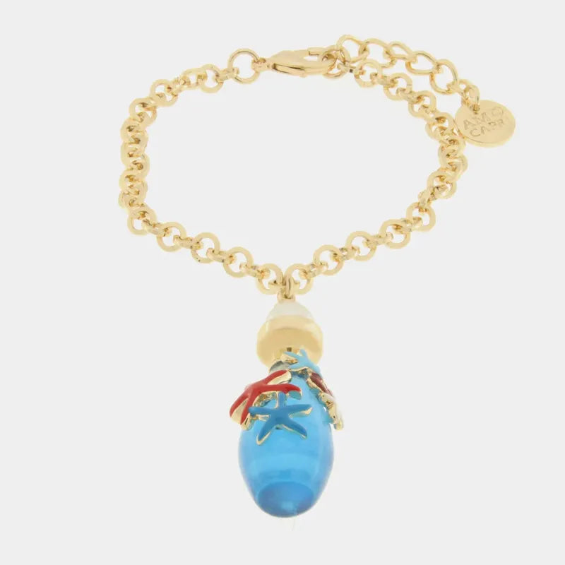 Bracciale in Metallo con bottgilina ovale e stelle marine