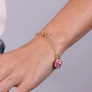 Bracciale in Metallo con dado rosa