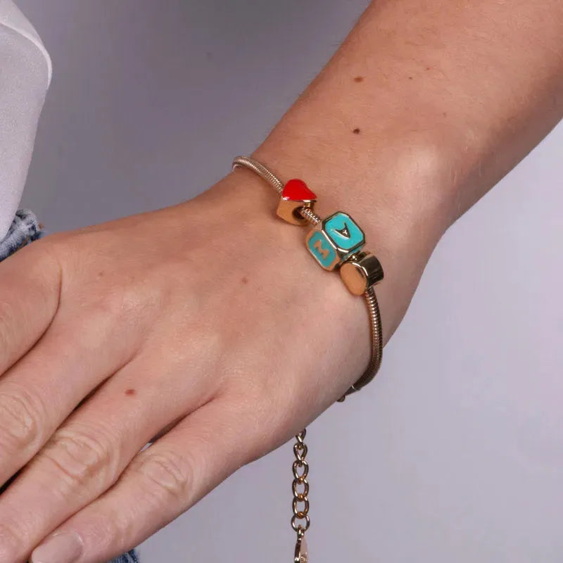 Bracciale in Metallo con dado della fortuna e cuore rosso