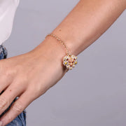 Bracciale in Metallo cuore impreziosito da fiori bianchi