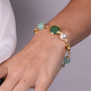 Bracciale in Metallo con cristallo verde e perle bianche e verde acqua