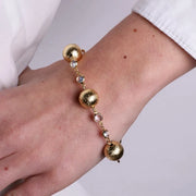Bracciale in Metallo con perle oro e cristallini