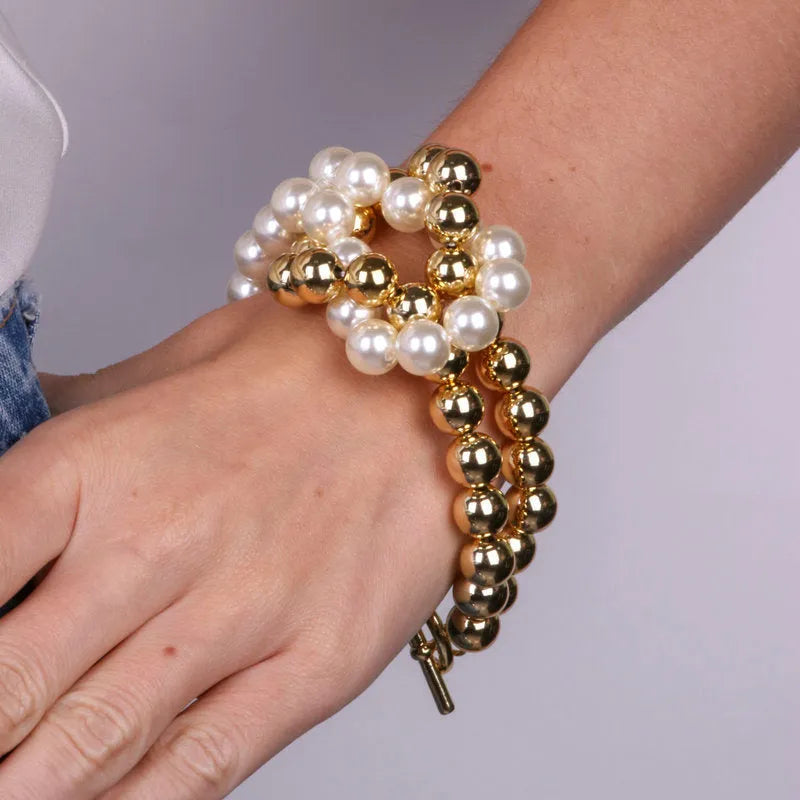Bracciale in Metallo con chiusura t-bar e perle bianche e oro - BYSIMON gioielli