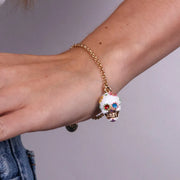 Bracciale in Metallo con capuzzella bianca impreziosita da fiori colorati