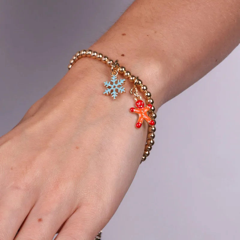 Bracciale in Metallo con fiocchi di neve e omino di pan di zenzero