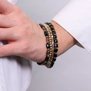 Bracciale in Metallo multifilo con perline oro e pietre nere