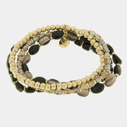 Bracciale in Metallo multifilo con perline oro e pietre nere