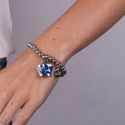 Bracciale in Metallo con borsa blu scritta capri