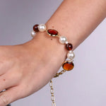 Bracciale in Metallo con perle e cristalli marroni - BYSIMON gioielli