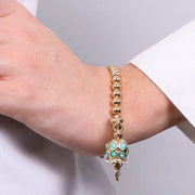 Bracciale in Metallo con campanella a pois verde e zirconi