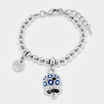 Bracciale in Metallo con campanella a pois blu e zirconi - BYSIMON gioielli