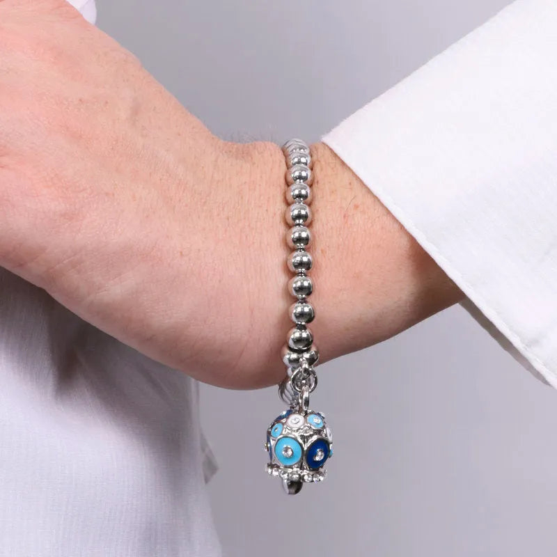 Bracciale in Metallo con campanella a pois blu e azzurro e zirconi - BYSIMON gioielli