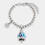 Bracciale in Metallo con campanella a pois blu e azzurro e zirconi - BYSIMON gioielli