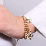 Bracciale in Metallo con campanella a pois  e zirconi multicolor - BYSIMON gioielli