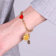 Bracciale in Metallo con riccio di mare placcato oro e cuore