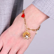 Bracciale in Metallo con riccio di mare placcato oro e stella bianca e cuore