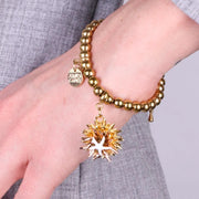 Bracciale in Metallo con riccio di mare placcato oro e stella bianca e cuore