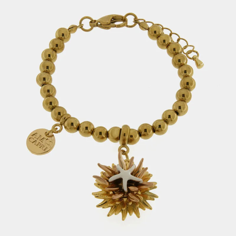 Bracciale in Metallo con riccio di mare placcato oro e stella bianca e cuore