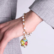 Bracciale in Metallo multifilo bianco con campana a fiori multicolor