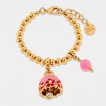 Bracciale in Metallo con campanella rosa e  fiori e perla - BYSIMON gioielli