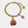 Bracciale in Metallo con campanella rosa e  fiori e perla