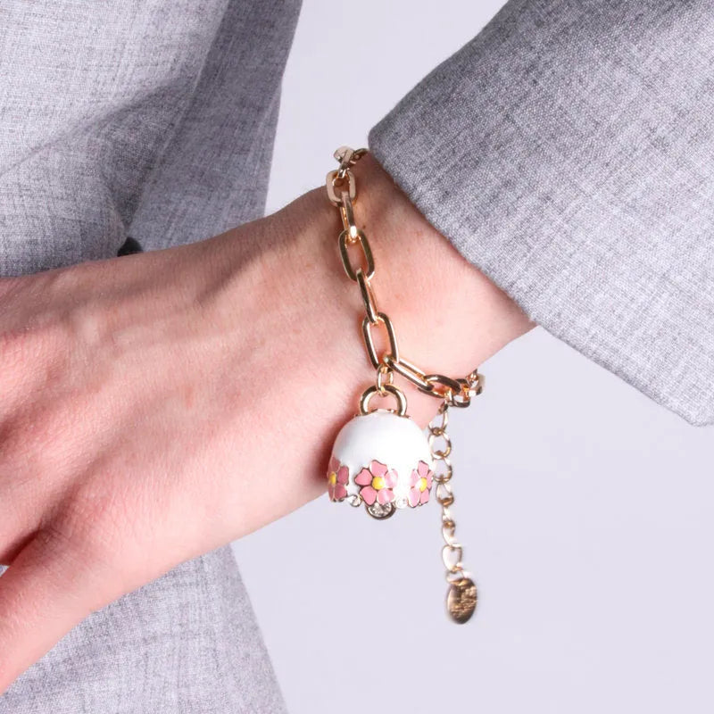 Bracciale in Metallo con campanella bianca e fiori rosa - BYSIMON gioielli