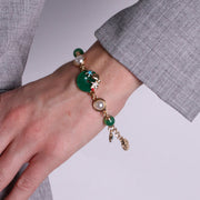 Bracciale in Metallo con pendente verde e stelle marine