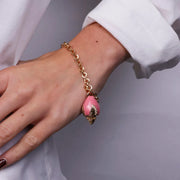 Bracciale in Metallo con pumo rosa e placcatura oro