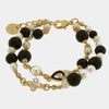 Bracciale in Metallo doppio filo con perle nere e bianco con croce zirconata