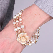 Bracciale in Metallo multifilo con fiore placcato oro