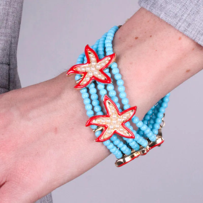 Bracciale in Metallo con sfere turchesi e stelle marine rosse bys - gioiello BySimon