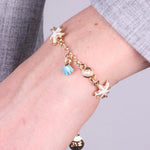 Bracciale in Metallo con stelle marine bianche e conchiglie turchese bys - gioiello BySimon
