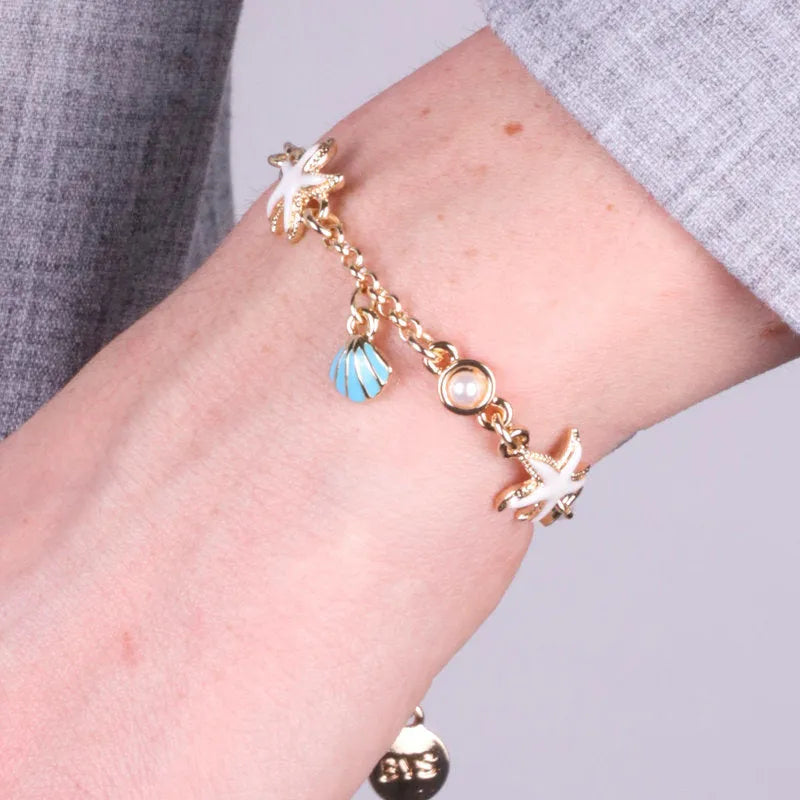 Bracciale in Metallo con stelle marine bianche e conchiglie turchese bys - gioiello BySimon