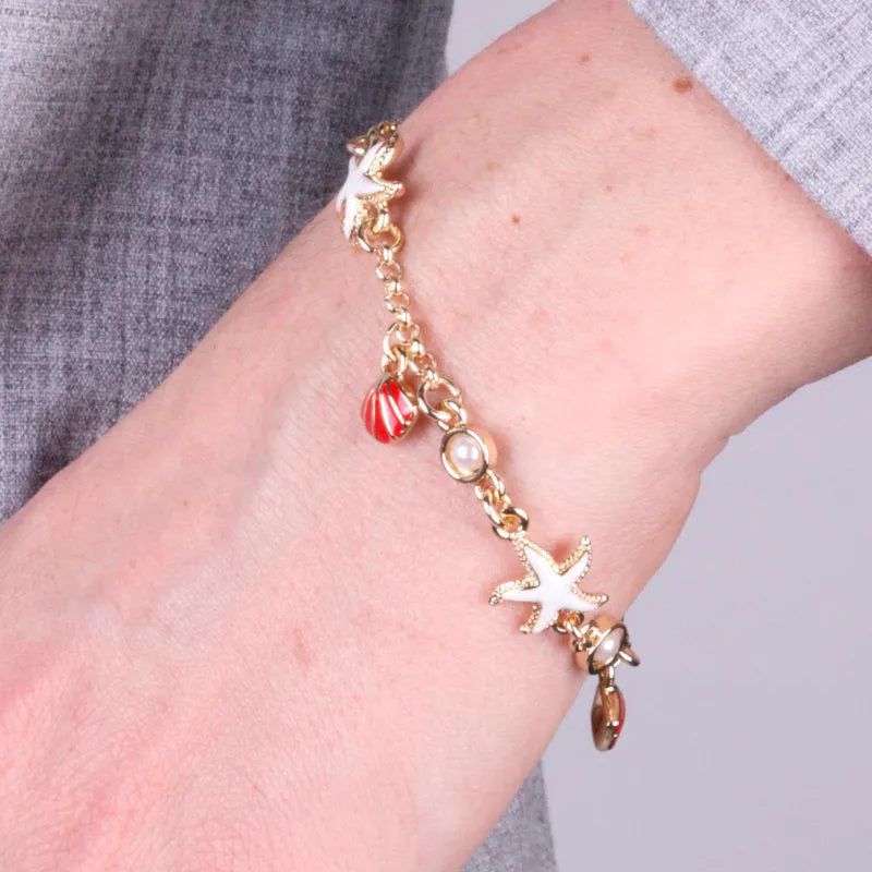 Metal Bracelet with white starfish and red seashells