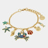 Bracciale in Metallo con granchio, stelle marine, pesciolino e conchiglie