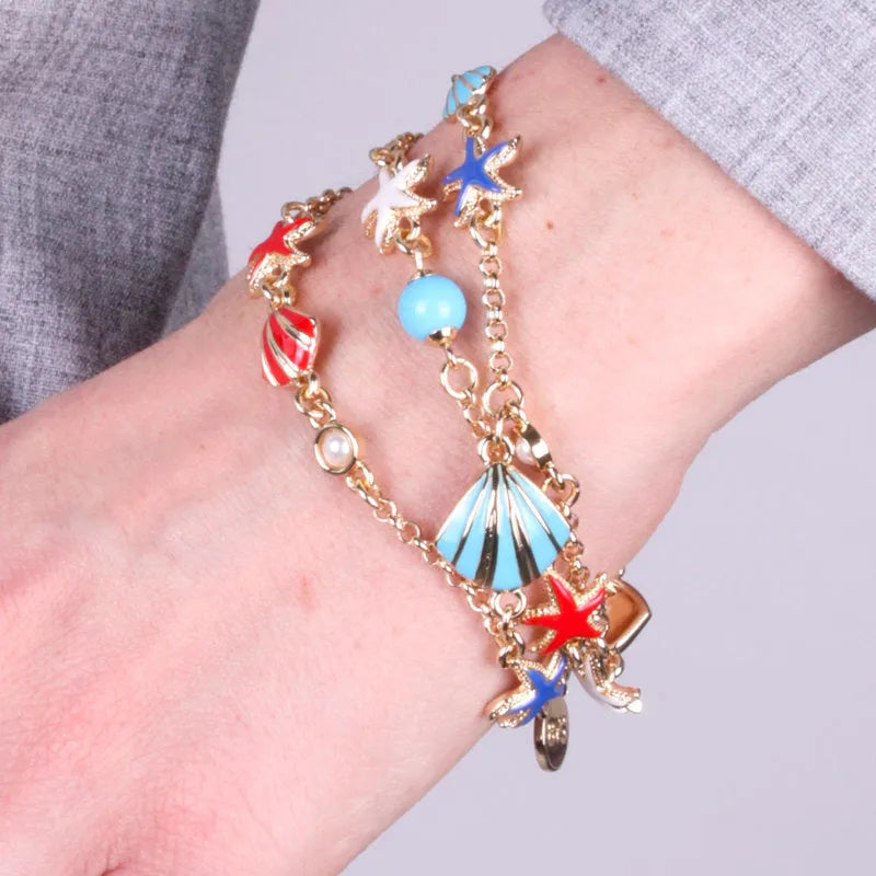 Bracciale in Metallo con conchiglie e stelle marine bys - gioiello BySimon
