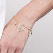 Bracciale in Metallo pendenti lisci e zirconi turchesi