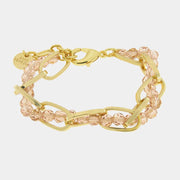 Bracciale in Metallo con cristalli rosa intrecciati