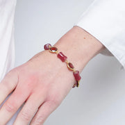 Bracciale in Metallo con cristalli marroni e sfere rosse