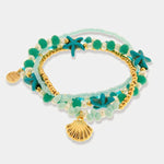 Bracciale in Metallo multifilo con cristalli verdi e conchiglia AMOVENEZIA - gioiello BySimon